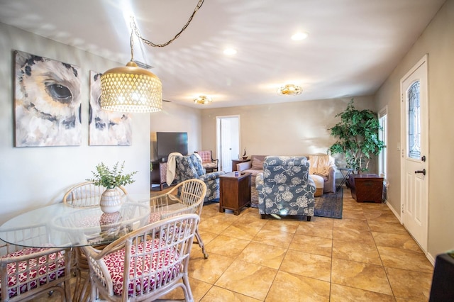 dining area featuring tile patterned flooring