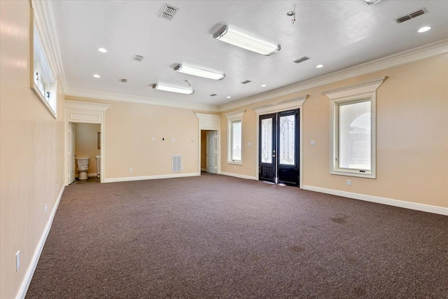 carpeted spare room with ornamental molding