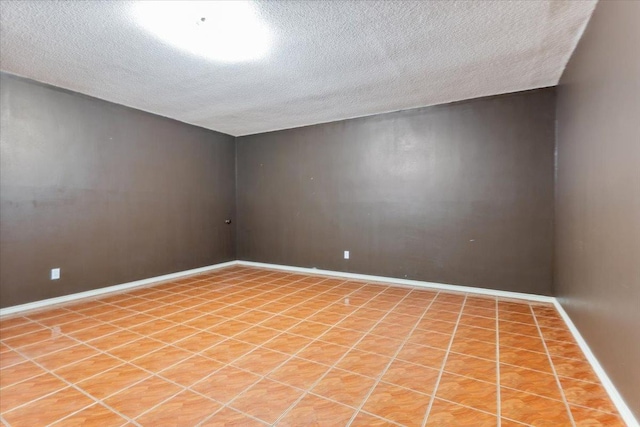 empty room with a textured ceiling