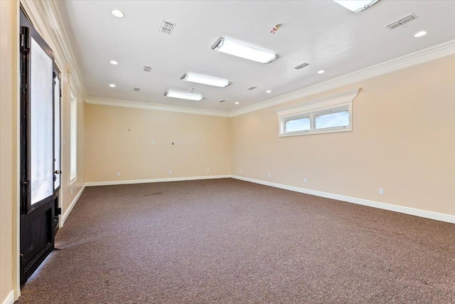 unfurnished room featuring crown molding and carpet flooring