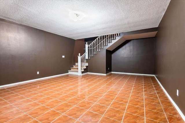 interior space with a textured ceiling