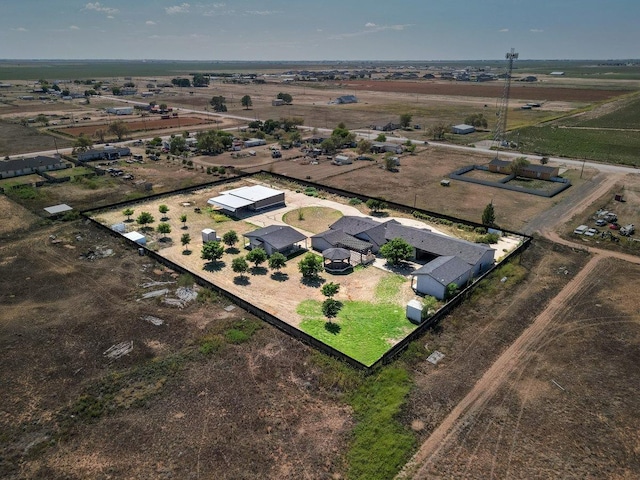 birds eye view of property featuring a rural view