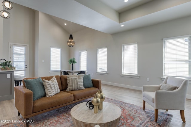 5713 119th St, Lubbock, TX 79424 - living area with light wood-type flooring, recessed lighting, and baseboards