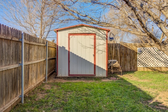 view of outbuilding featuring a lawn