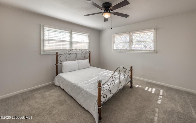 3410 53rd St, Lubbock, TX 79413 - carpeted bedroom featuring baseboards and a ceiling fan