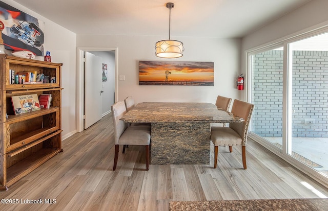 3410 53rd St, Lubbock, TX 79413 - dining area featuring light wood-style floors