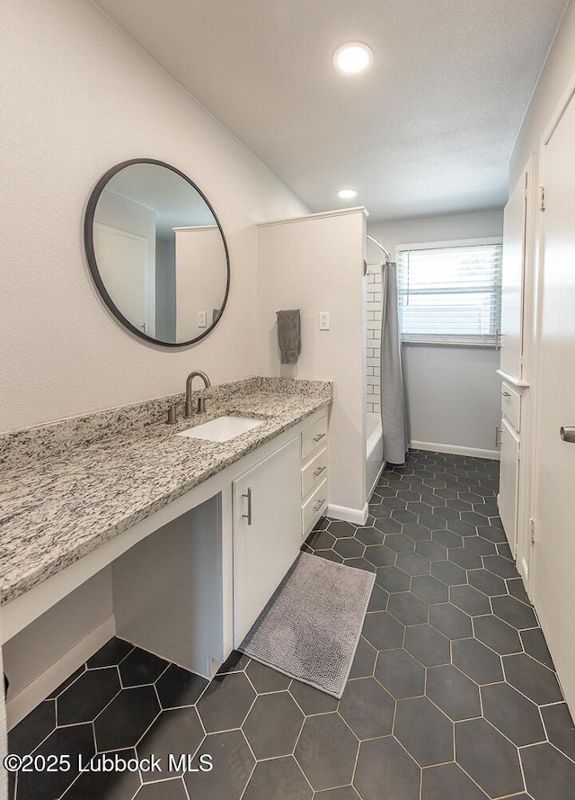 3410 53rd St, Lubbock, TX 79413 - full bath with vanity, recessed lighting, tile patterned flooring, and shower / tub combo with curtain