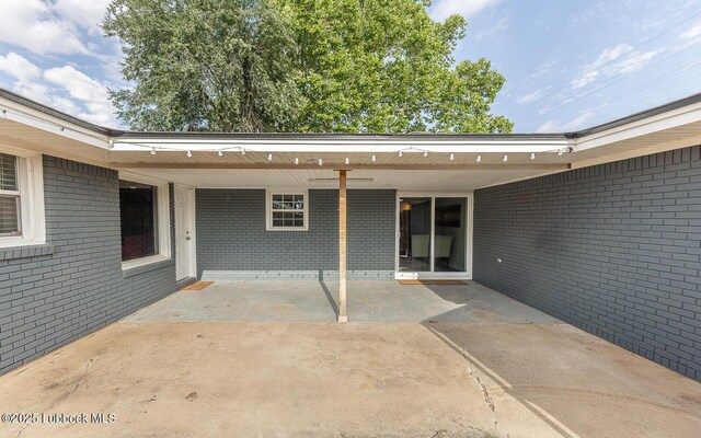 3410 53rd St, Lubbock, TX 79413 - view of patio with an attached carport