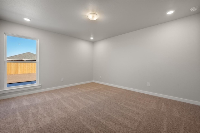 view of carpeted spare room