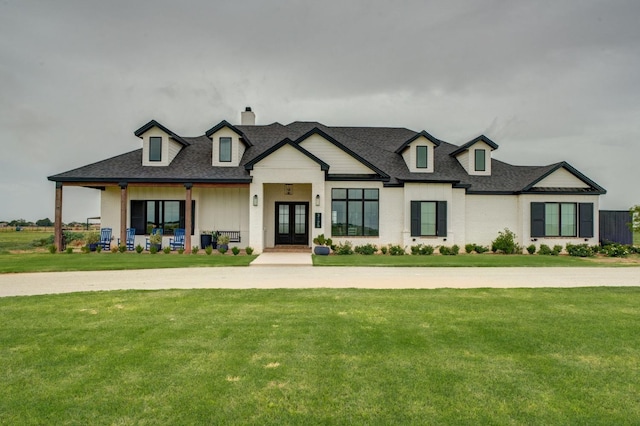 view of front of property with a front lawn