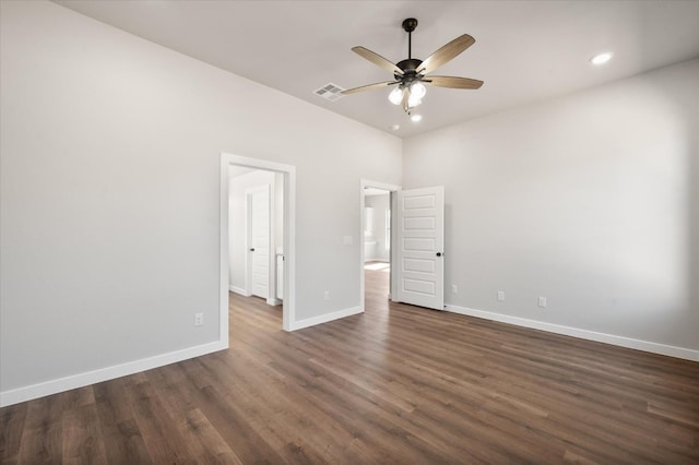 unfurnished bedroom with dark hardwood / wood-style flooring and ceiling fan