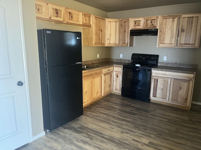 kitchen featuring dark hardwood / wood-style flooring, sink, light brown cabinetry, and black appliances