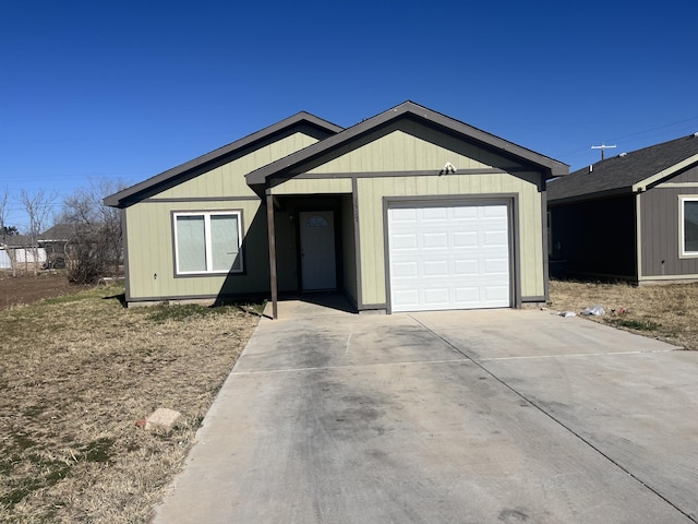 single story home featuring a garage