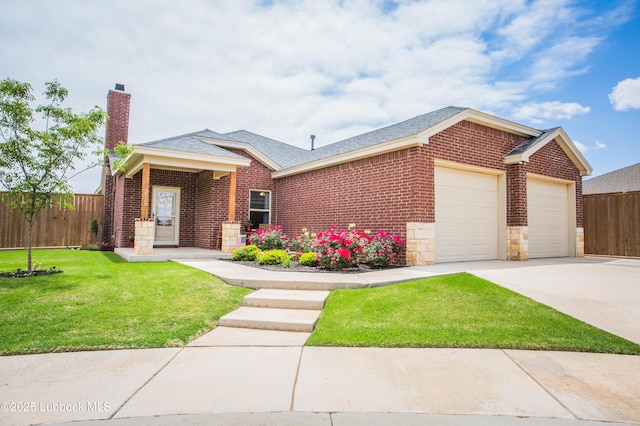 5719 117th St, Lubbock, TX 79424 - view of front of property with an attached garage, concrete driveway, a chimney, and brick siding