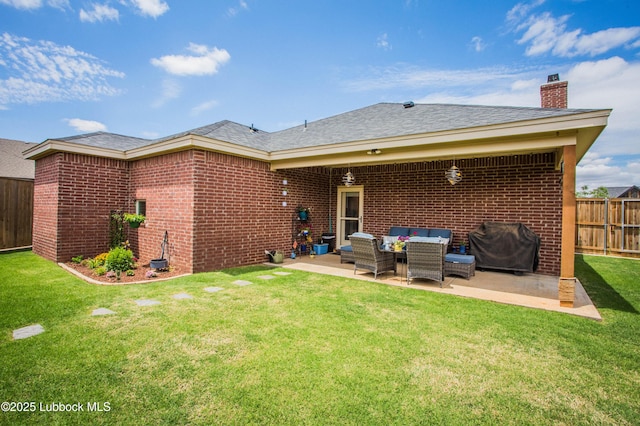 5719 117th St, Lubbock, TX 79424 - rear view of property with a patio, a chimney, brick siding, and outdoor lounge area