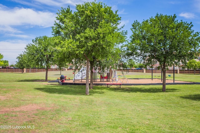7023 35th St, Lubbock, TX 79407 - view of home's community featuring fence and a lawn