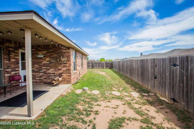 7023 35th St, Lubbock, TX 79407 - view of yard with a patio area and a fenced backyard