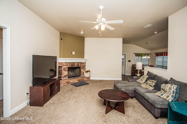 7023 35th St, Lubbock, TX 79407 - living room featuring lofted ceiling, baseboards, carpet flooring, ceiling fan, and a fireplace