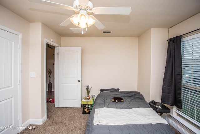 7023 35th St, Lubbock, TX 79407 - carpeted bedroom featuring a ceiling fan, baseboards, and visible vents