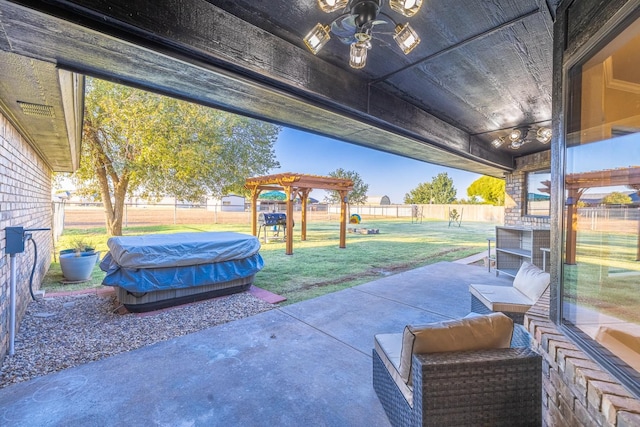 view of patio with a pergola and a playground