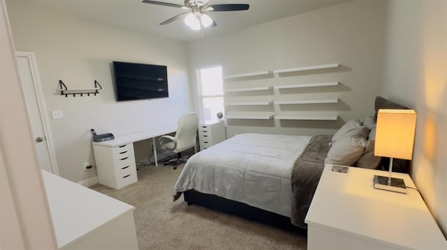 bedroom with ceiling fan and light colored carpet