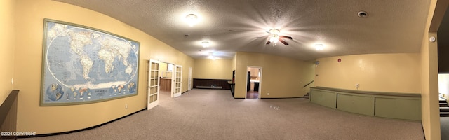 interior space with a textured ceiling