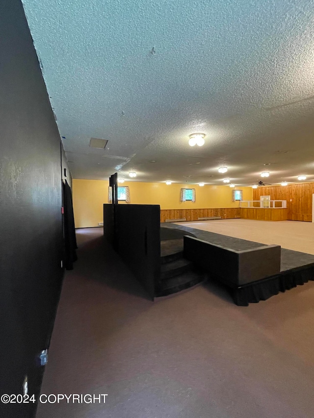 interior space featuring a textured ceiling