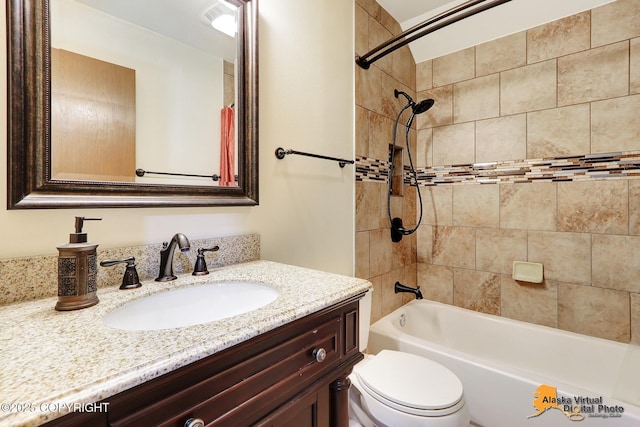 full bath with shower / bathing tub combination, toilet, and vanity