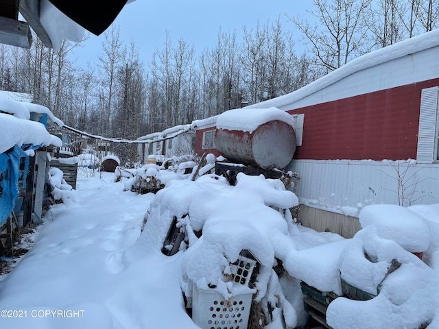 view of snow covered property