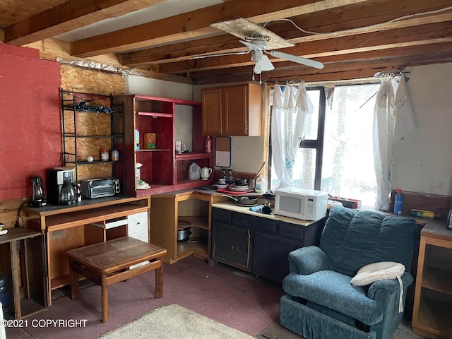 kitchen with ceiling fan and beam ceiling