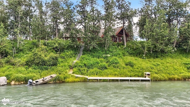 33405 Keystone Dr, Soldotna, AK 99669 - dock with a water view and view of wooded area