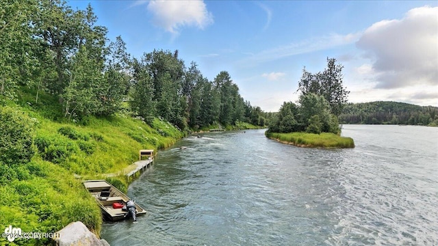 33405 Keystone Dr, Soldotna, AK 99669 - water view featuring a heavily wooded area and a boat dock