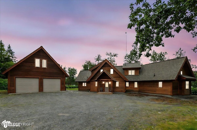 33405 Keystone Dr, Soldotna, AK 99669 - log-style house with a garage, roof with shingles, and an outdoor structure