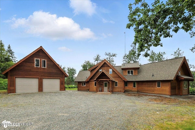 33405 Keystone Dr, Soldotna, AK 99669 - log home featuring a garage and roof with shingles