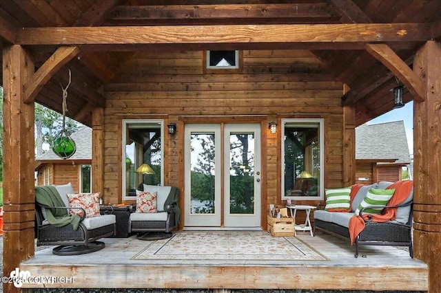 33405 Keystone Dr, Soldotna, AK 99669 - doorway to property with french doors, a wooden deck, and an outdoor living space