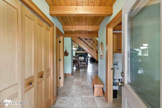 33405 Keystone Dr, Soldotna, AK 99669 - corridor with a wood ceiling with exposed beams and stone tile floors