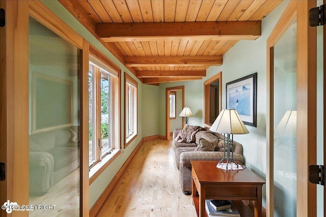 33405 Keystone Dr, Soldotna, AK 99669 - sitting room with a wooden ceiling with exposed beams and light wood finished floors