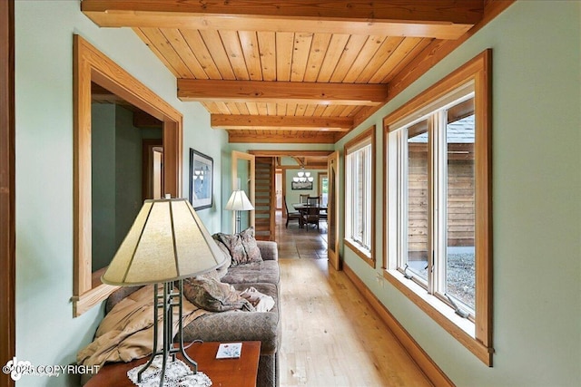 33405 Keystone Dr, Soldotna, AK 99669 - hall with light wood finished floors, healthy amount of natural light, and a wood ceiling with exposed beams
