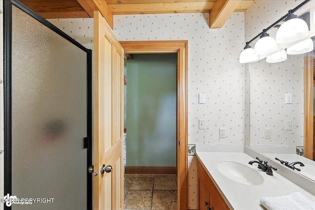 33405 Keystone Dr, Soldotna, AK 99669 - full bath featuring vanity, a shower stall, wallpapered walls, and stone finish flooring