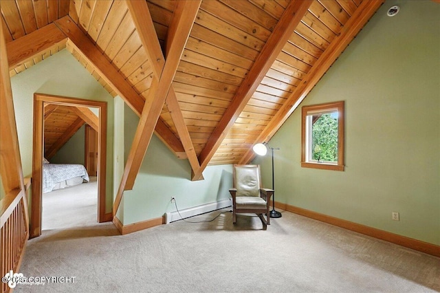 33405 Keystone Dr, Soldotna, AK 99669 - living area featuring a baseboard heating unit, wooden ceiling, and carpet