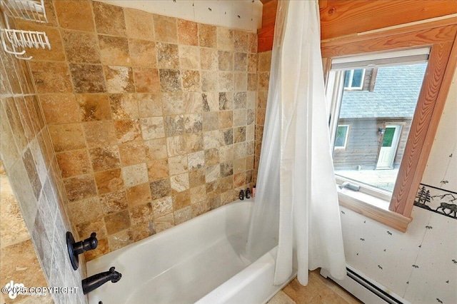 33405 Keystone Dr, Soldotna, AK 99669 - bathroom featuring shower / tub combo and a baseboard heating unit