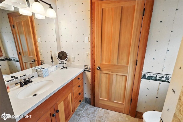 33405 Keystone Dr, Soldotna, AK 99669 - half bathroom with vanity and wallpapered walls