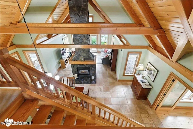 33405 Keystone Dr, Soldotna, AK 99669 - staircase with a wood stove and stone tile floors