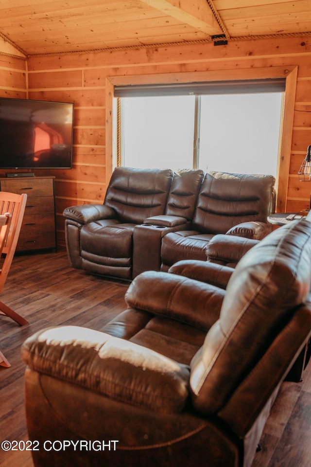 living room with wood-type flooring, wood walls, and wood ceiling