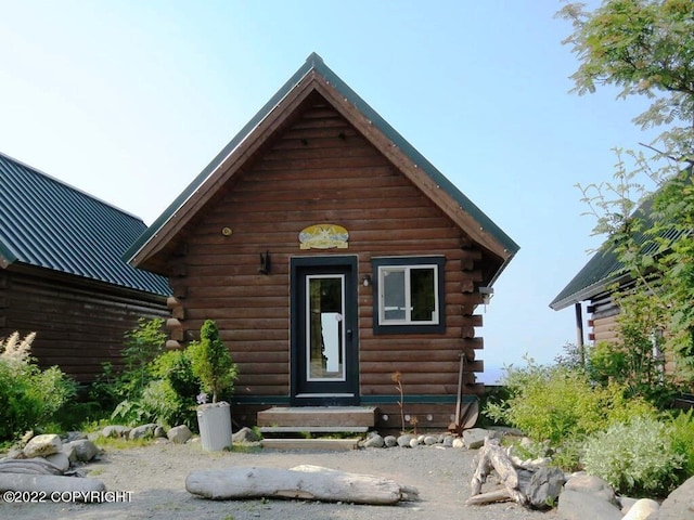 view of log-style house