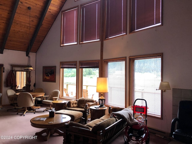 carpeted living room with high vaulted ceiling, beam ceiling, wooden ceiling, and a healthy amount of sunlight