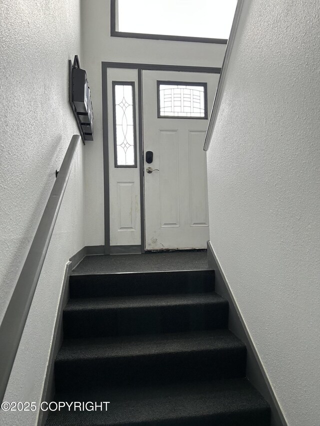 3940 E 9th Ave, Anchorage, AK 99508 - stairs featuring a textured wall