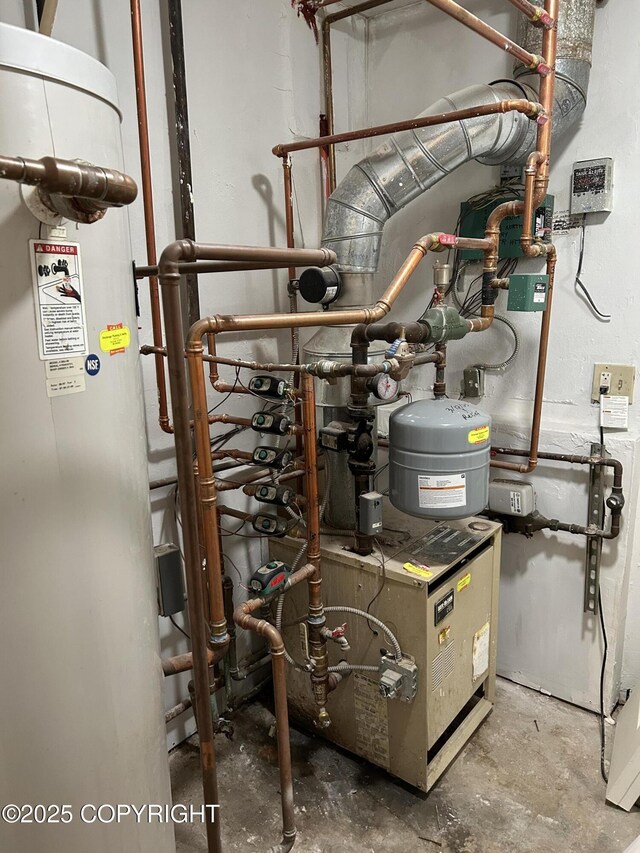 3940 E 9th Ave, Anchorage, AK 99508 - utilities featuring water heater and a heating unit