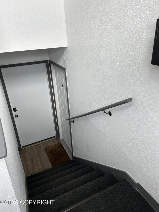 3940 E 9th Ave, Anchorage, AK 99508 - stairway with a textured wall