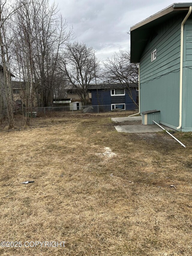 3940 E 9th Ave, Anchorage, AK 99508 - view of yard with fence
